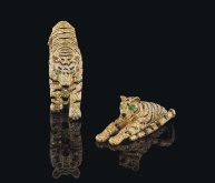Broches Tigers de Cartier, diamants jaunes, onyx et yeux en émeraudes, 1956. Estimation: 1 400 000- 1 900 000 euros.